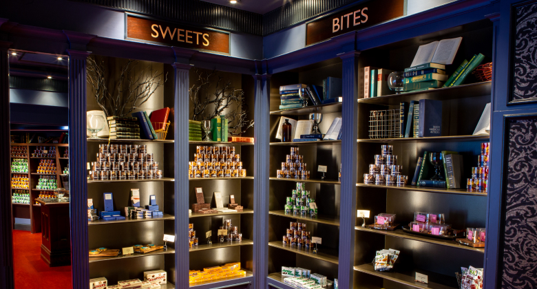 Sweet treats and bites on offer at the Lyric Theatre. Image shows shelves full of food and sweet offerings